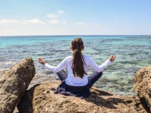 Woman practicing mindfulness meditation 