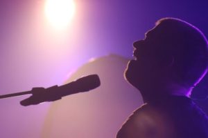 Man singing at concert