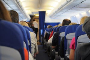 Passengers inside an airplane cabin