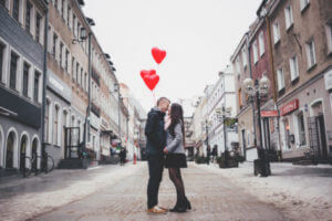 Couple kissing in middle of street