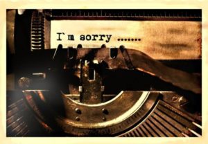 "I'm sorry" apology on typewriter
