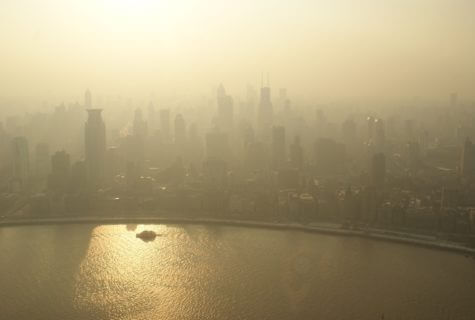 Smog and air pollution causes a haze over a city