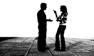 Silhouette of couple arguing