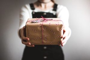 Person giving a gift