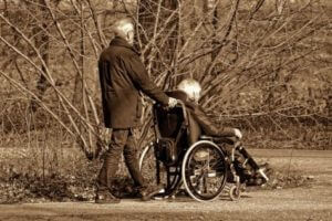 Elderly couple taking walk