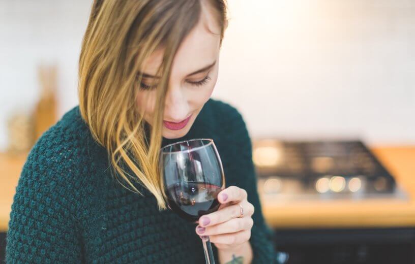 Woman drinking glass of wine