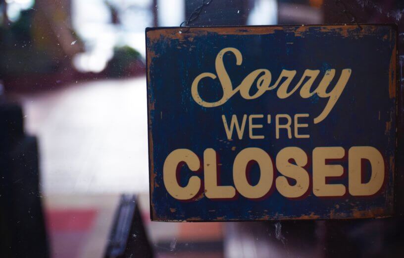 "Sorry, We're Closed" sign