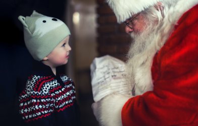 Santa Claus with young child