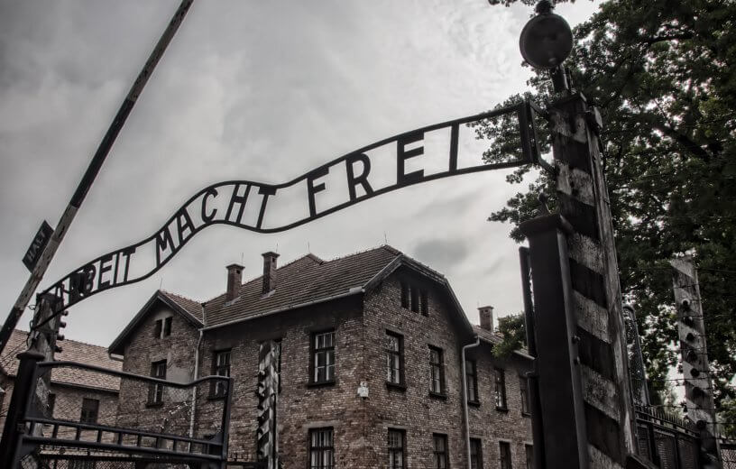 "Arbeit Macht Frei" sign seen outside Holocaust concentration camp