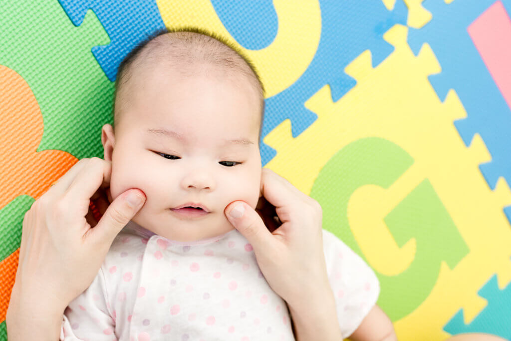 Love pinching babies' cheeks? Study explores basis of 'cute aggression