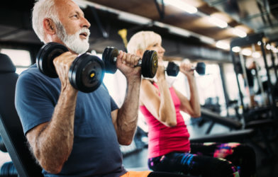 Older adults working out at gym