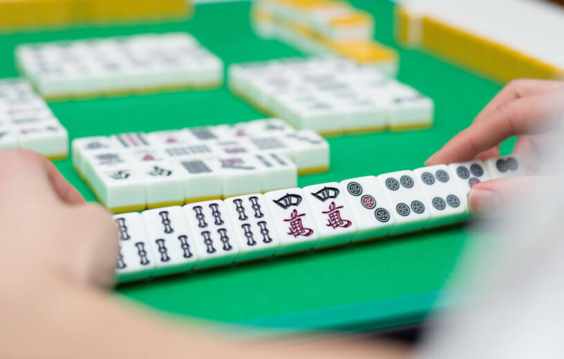 People playing Mahjong