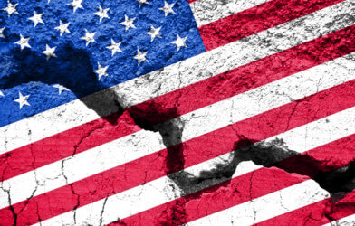 Cracked, split American flag indicates divided country