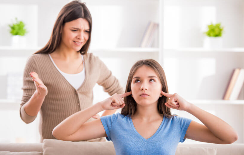 Teen daughter ignoring her mother