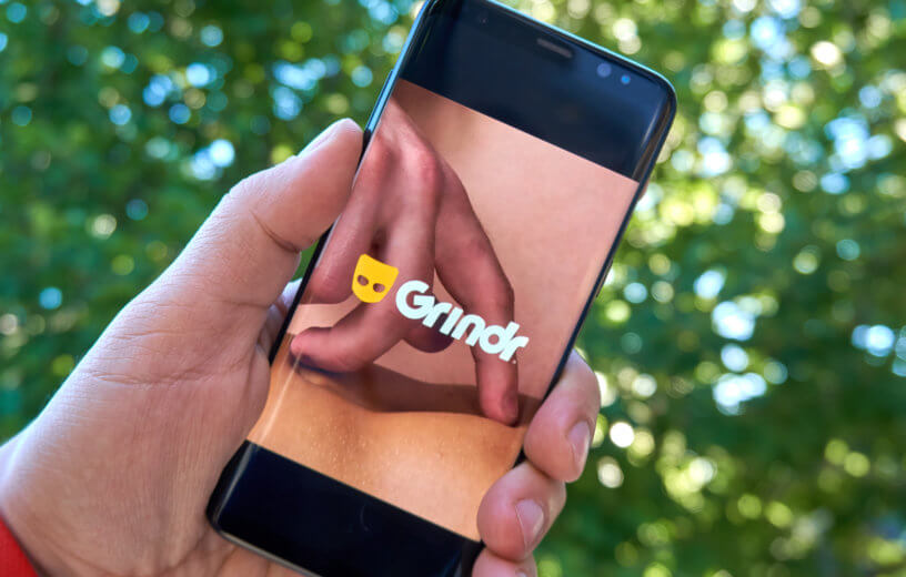 Grindr dating app on phone