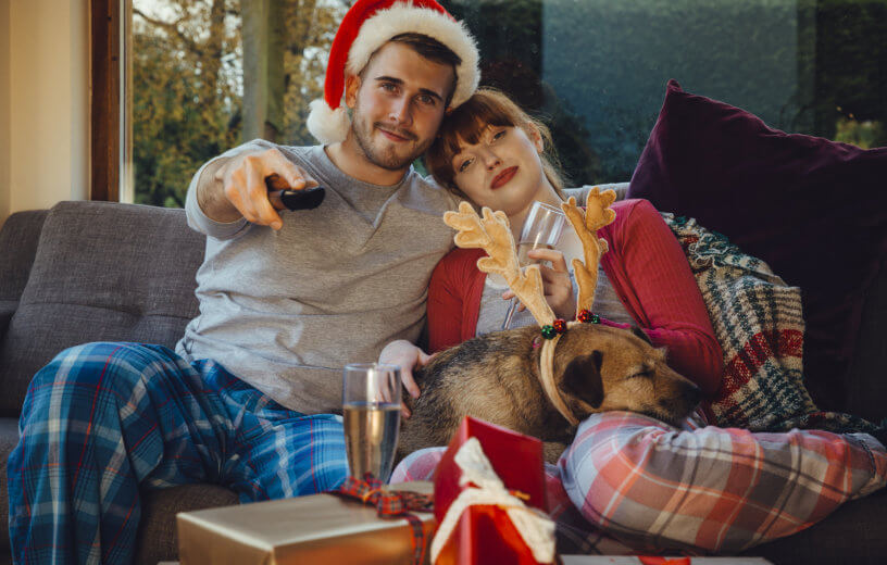 Couple watching holiday or Christmas movie