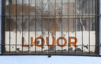Liquor store sign in window
