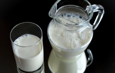 Jar and glass of milk