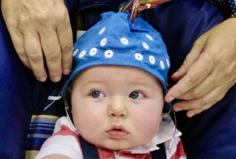 Baby wearing cap for study