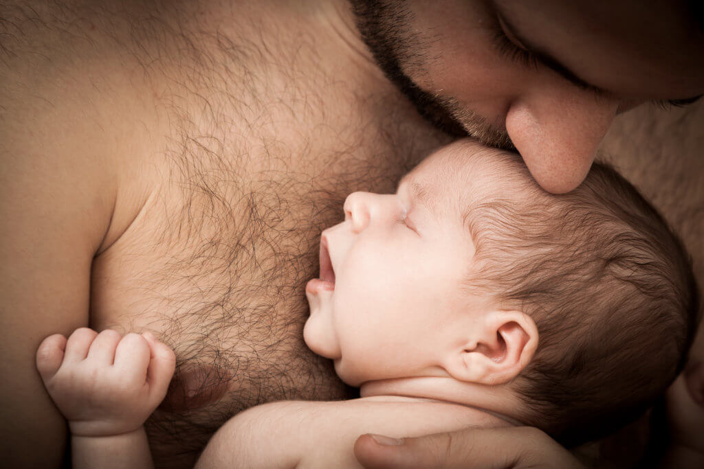 Newborn baby with father