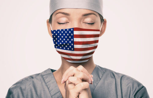 Nurse wearing American flag mask during coronavirus / COVID-19 pandemic