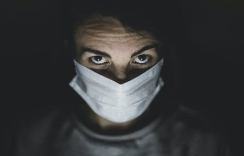 Person wearing mask during coronavirus / COVID-19 outbreak