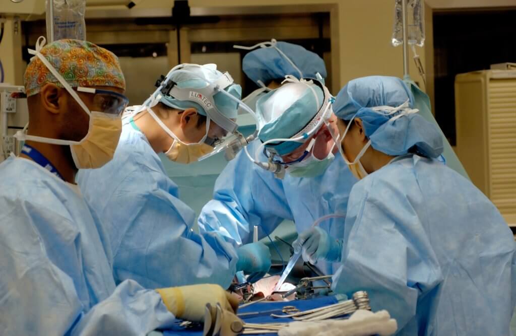 Doctors performing surgery
