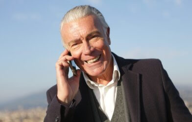 Older man talking on phone