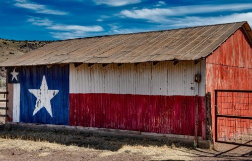 Texas flag painted on barn