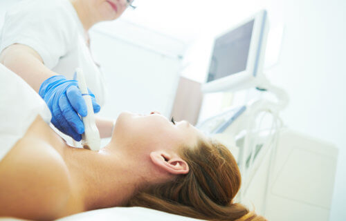 Woman undergoing thyroid cancer screening