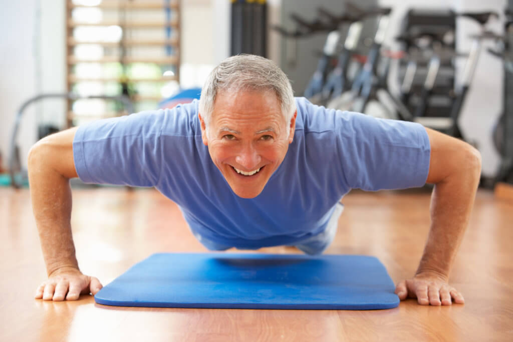 Senior man doing pushups, exercise, working out