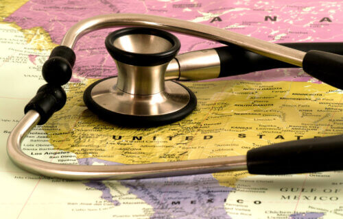 Stethoscope over map of America: Heart problems in USA