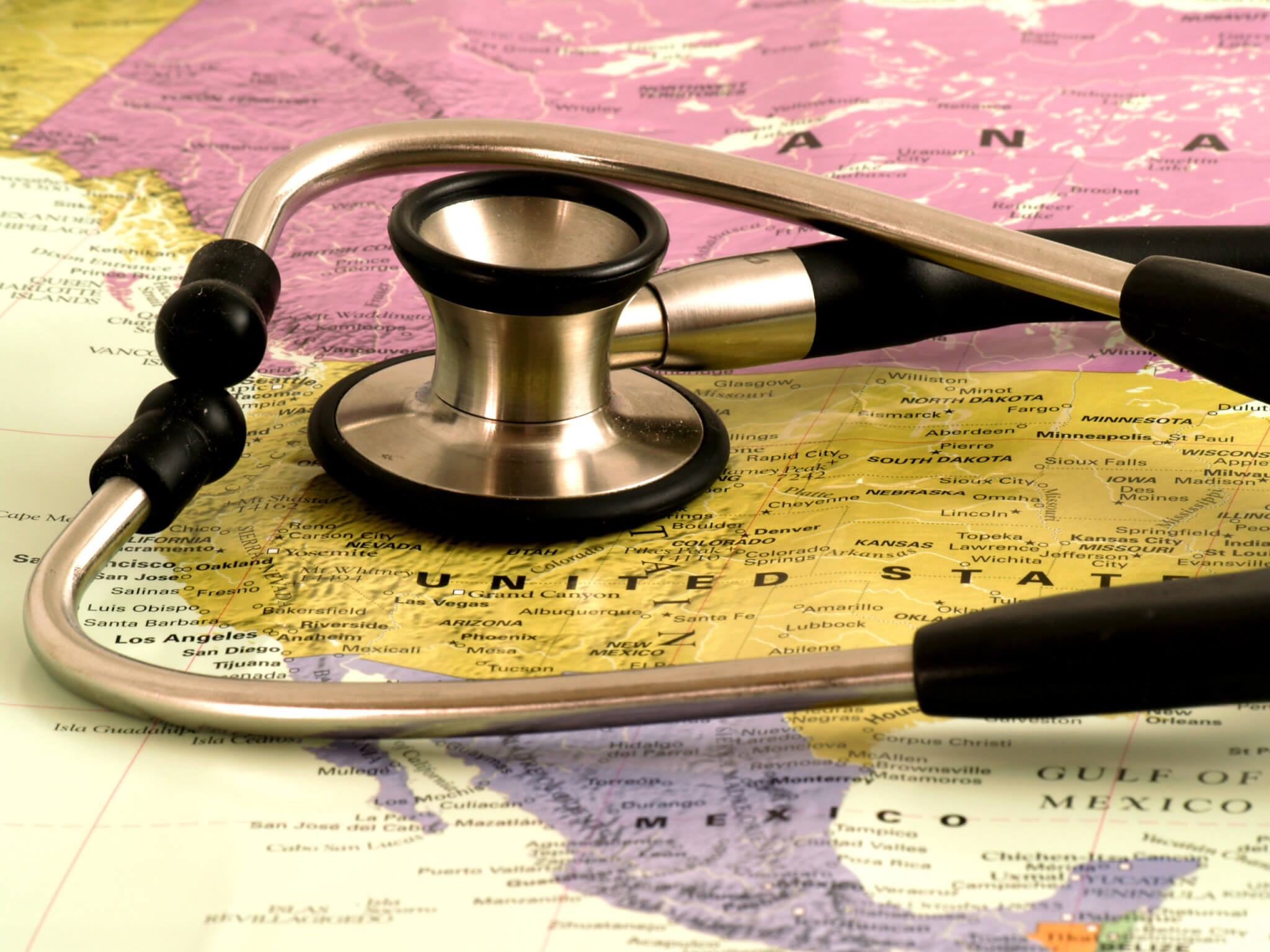 Stethoscope over map of America: Heart problems in USA