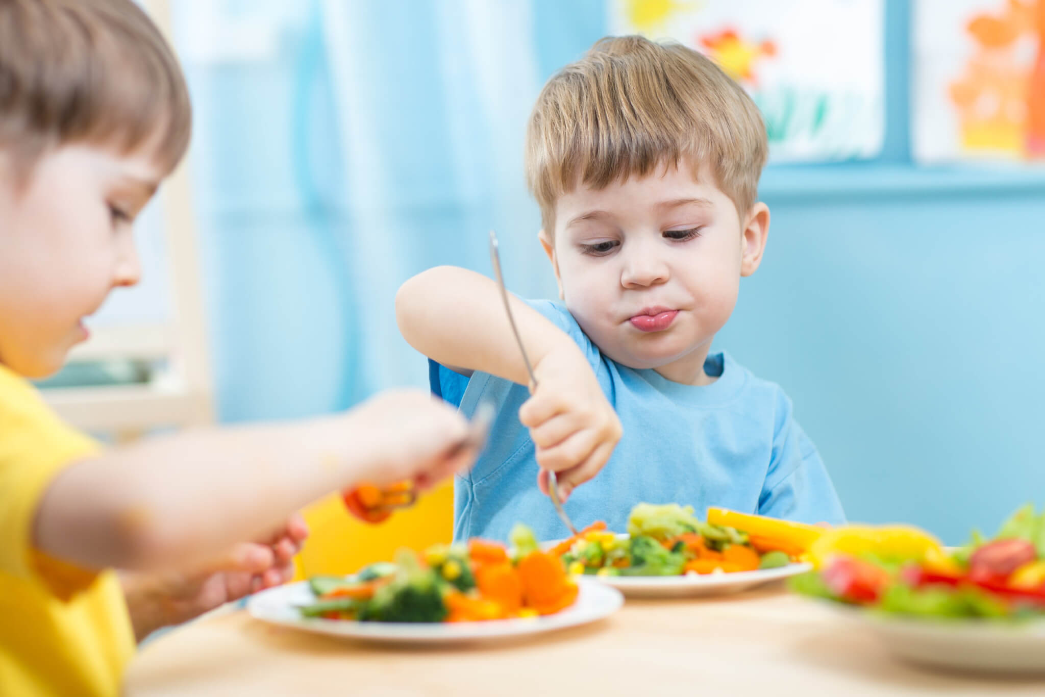 Children eating vegetables