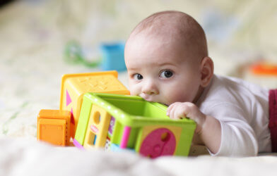 Baby teething on toys