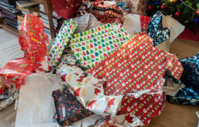 Holiday wrapping paper trash pile