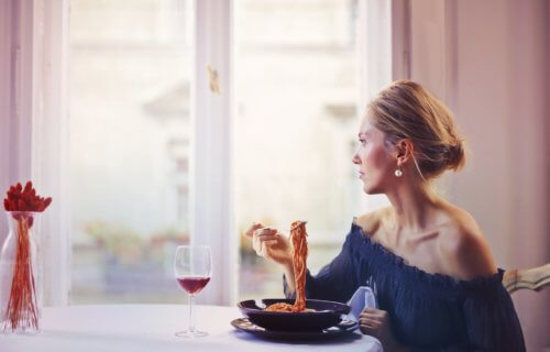 woman eating alone
