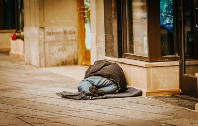 homeless person sleeping on street