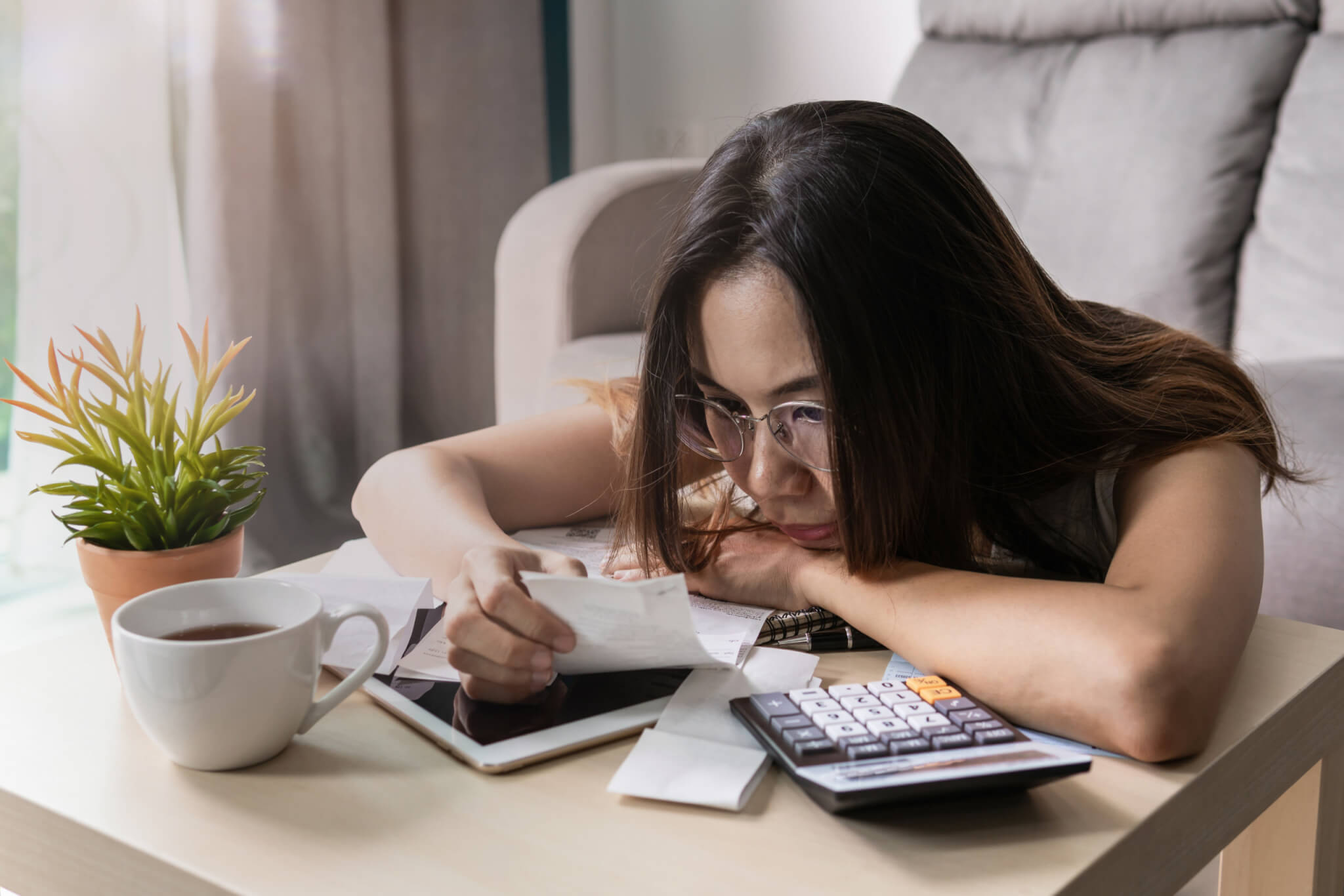 Woman worried about money, finances, bills