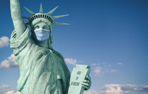Statue of Liberty wearing mask during COVID-19 pandemic in New York City