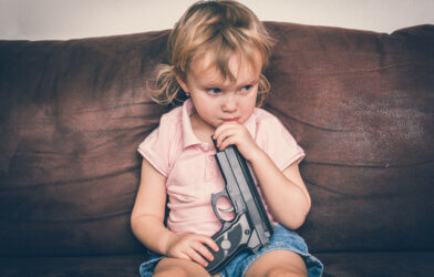 Child playing with gun