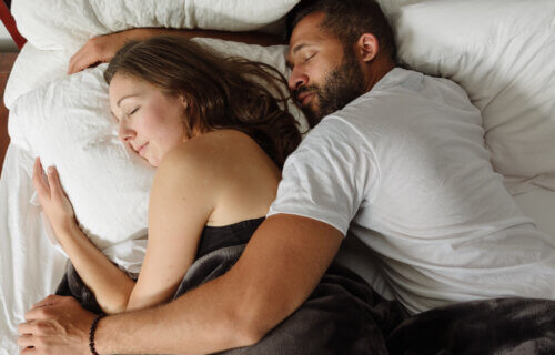 Couple sleeping in bed