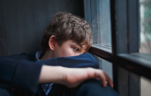 Teen boy sad, depressed, alone