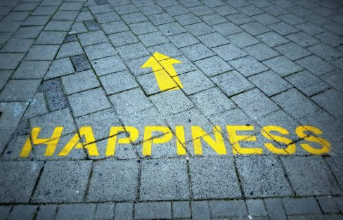 Happiness path printed on a sidewalk