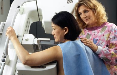 Woman undergoing a mammogram