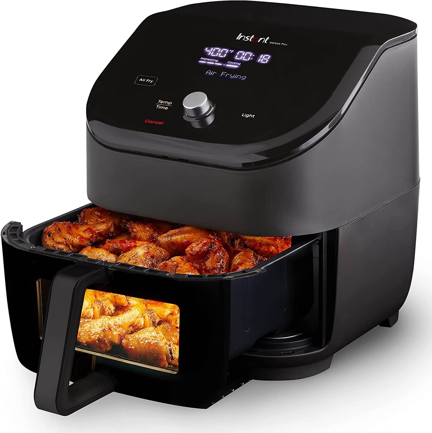 black air fryer with drawer open and food inside