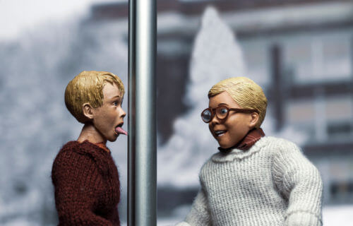 Mashup scene from Christmas Story and Home Alone - Ralphie Parker gets Kevin McCallister to put his tongue on the flagpole - Neca action figures.