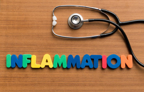Inflammation spelled out with stethoscope