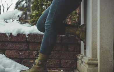 Woman wearing winter boots in snow