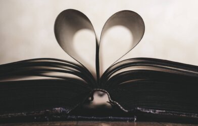 Romance novels: Book with pages folded into a heart